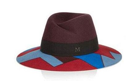 选用最稀有的稻草,毡绒或绸带,michel善于运用各种材料来制造帽子.